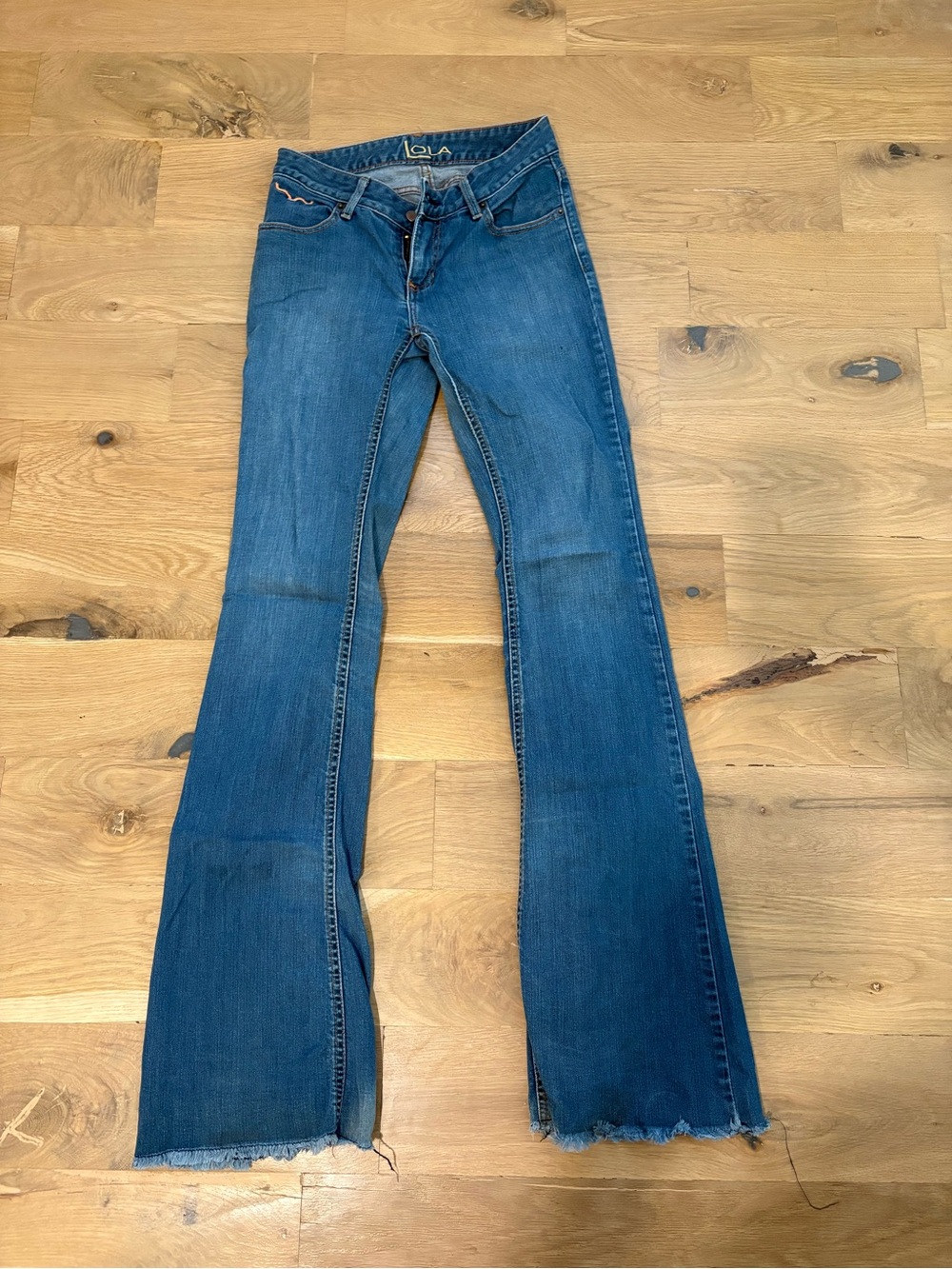 Kimes Ranch lola Medium Blue Cropped Flare Jeans with Raw Hem